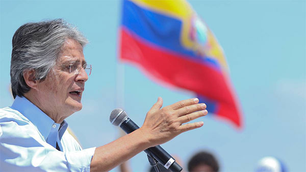 Guillermo Lasso promete regularizar a migrantes venezolanos en Ecuador